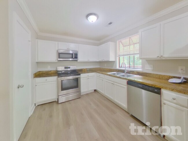 Foto del edificio - 5911 Leatherwood Ln