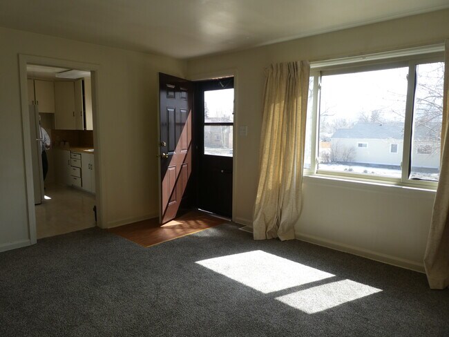 front door and kitchen - 708 W 1st Ave
