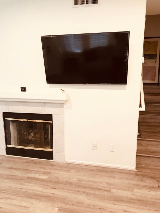 Living room fireplace - 47 Night Heron Ln