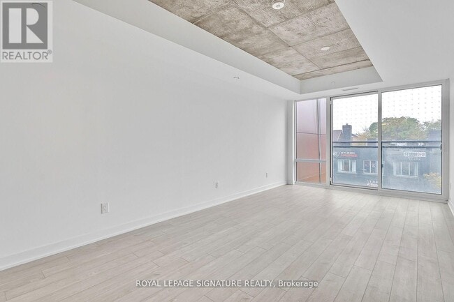 Building Photo - 665 Queen St E