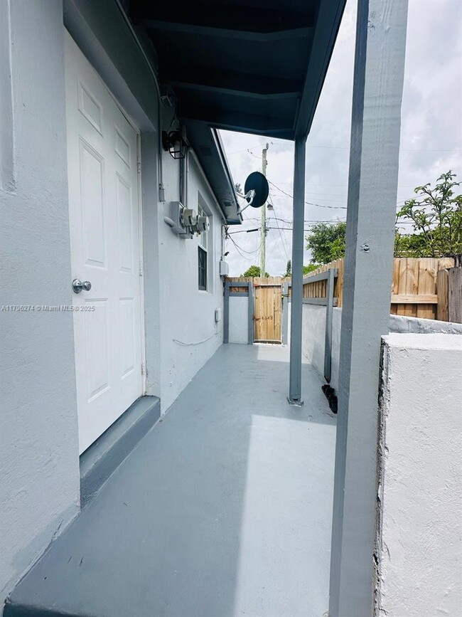 Building Photo - 115 NW 56th Ave.