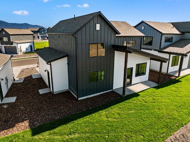 Building Photo - Lock-and-Leave Luxury Living — Lawn Care & Snow Removal Included!