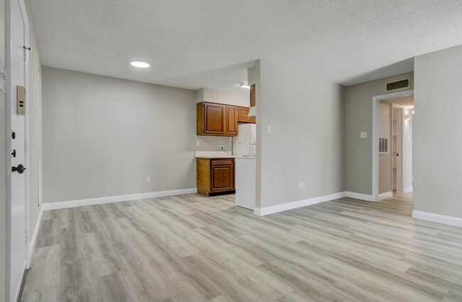 Living Room-Kitchen - Broadway Square Apartments