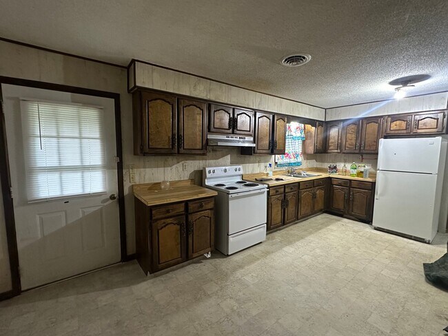 Foto del edificio - 825 Bill McDaniel Ln