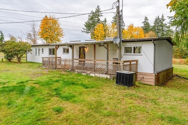 Building Photo - THREE BEDROOM MANUFACTURED HOME WITH SHOP