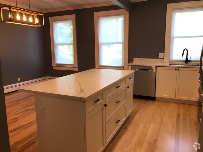 Kitchen Island and Dining Area - 231 Broadway