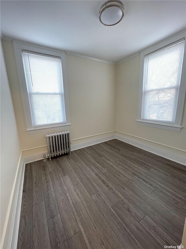 Building Photo - 65-37-65-52 52nd Ave