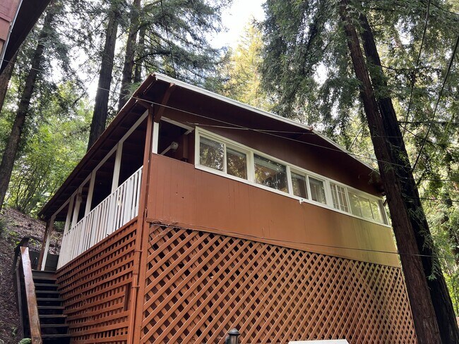 Building Photo - Two Bedroom hilltop home with Carport, lar...