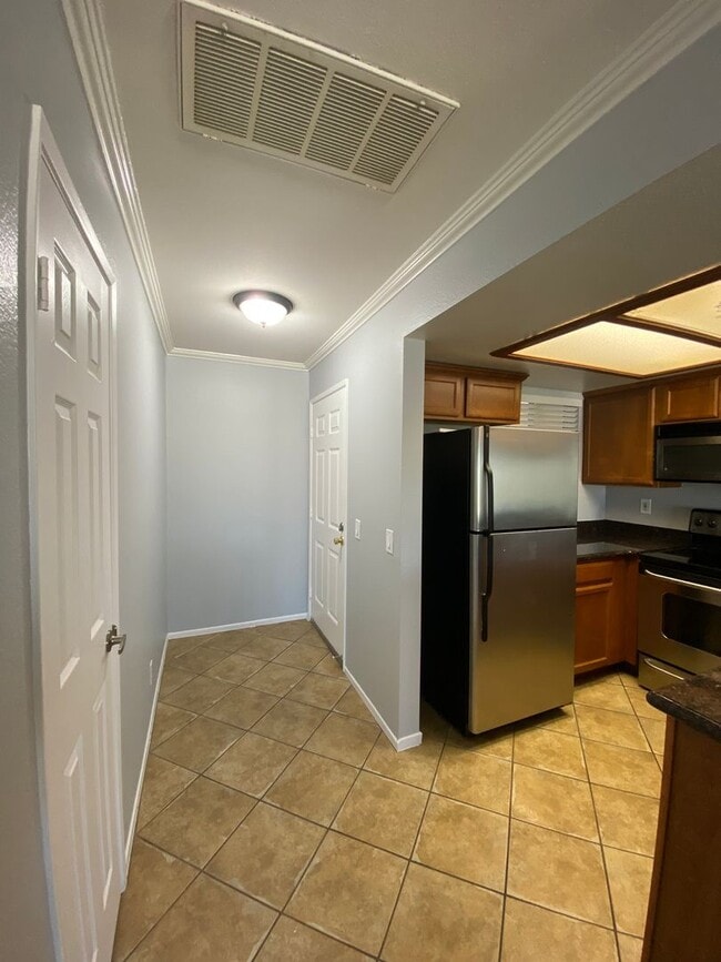 Building Photo - The Palms Condo