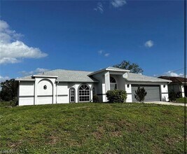 Building Photo - 6561 Astoria Ave