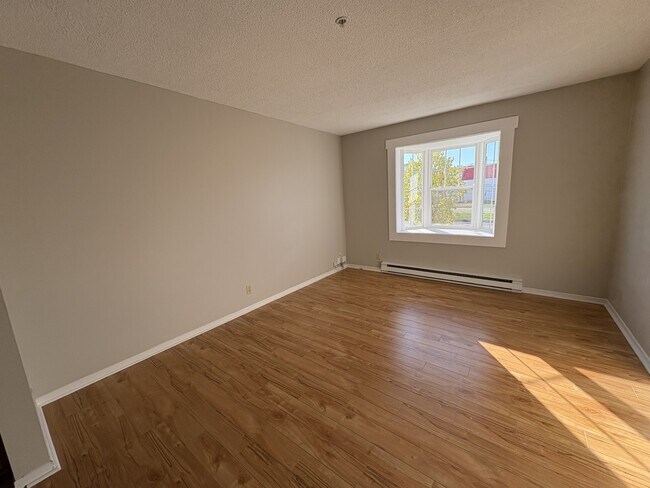 Photo du bâtiment - 151 Queen St