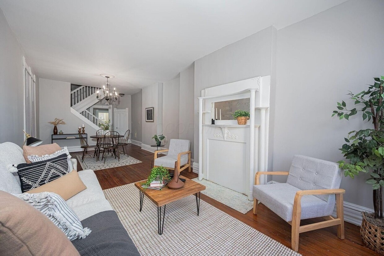 Spacious living room and dining area - 248 W 4th Ave