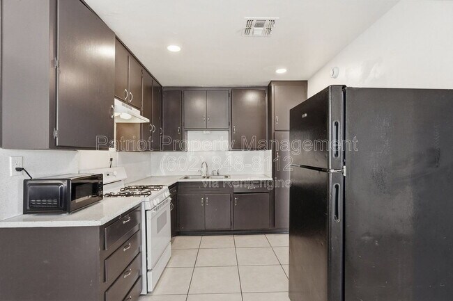 Building Photo - 6701 N 33rd Ave
