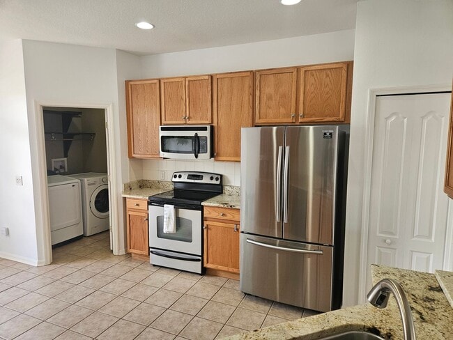 Photo - "Move in with a 12-month lease starting No... House