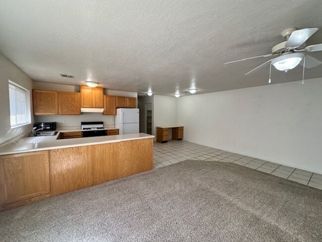 Building Photo - Move-In Discount -- 2 Bedroom - 2 bath Apartment with Garage!