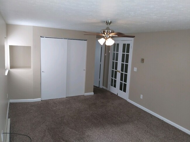 Building Photo - Corner Lot and Vaulted Ceilings!