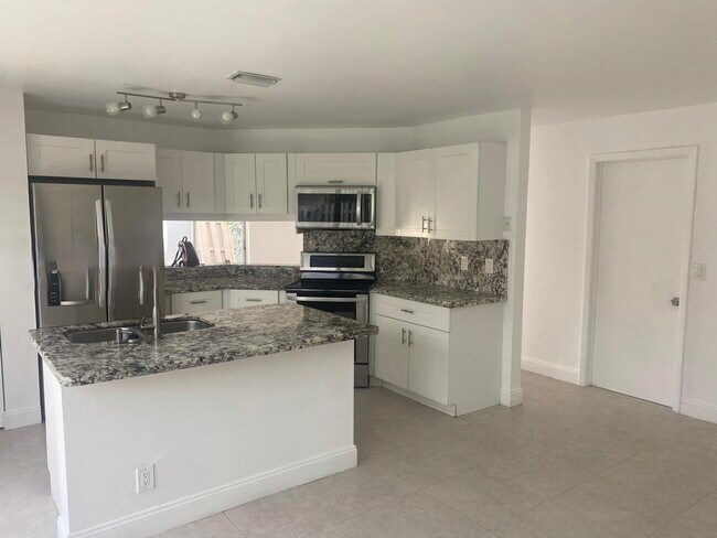 Photo - Northwest 107th Way, Sunrise, FL 33351 - 3... House