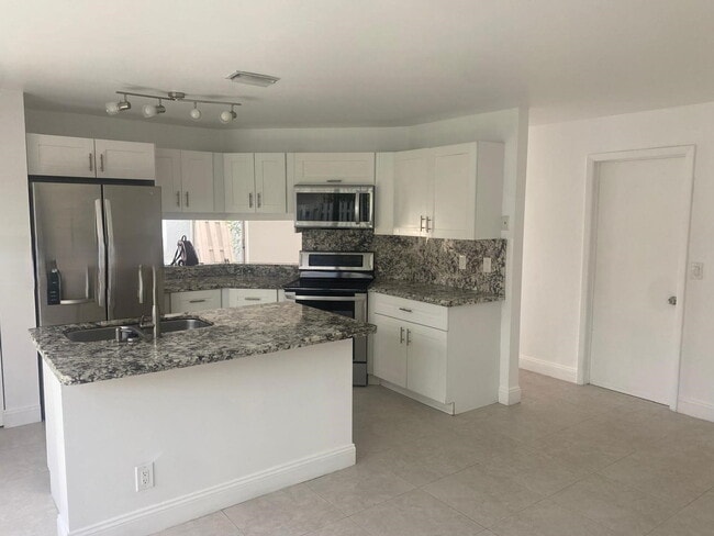 Building Photo - Northwest 107th Way, Sunrise, FL 33351 - 3 BR 2 BA single-family home