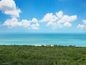 Building Photo - 7225 Pelican Bay Blvd