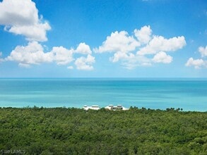 Building Photo - 7225 Pelican Bay Blvd