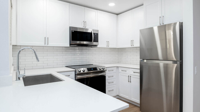 Kitchen with Stainless Steel Appliances - Carmel Terrace