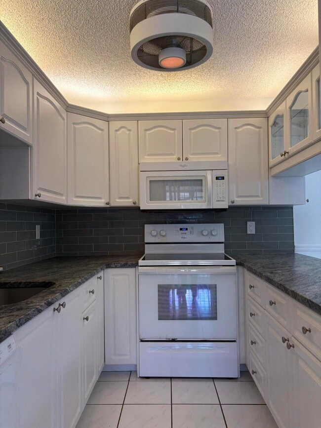 Foto del edificio - 203 SE Camelot Gardens Blvd