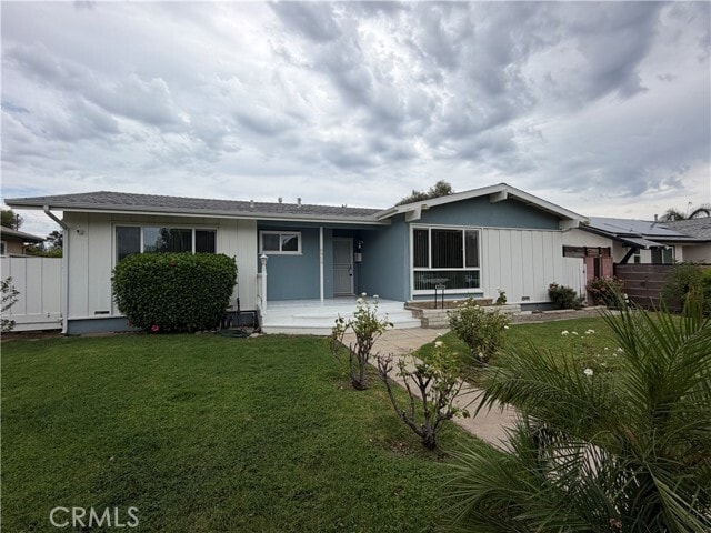 Building Photo - 6934 Woodlake Ave