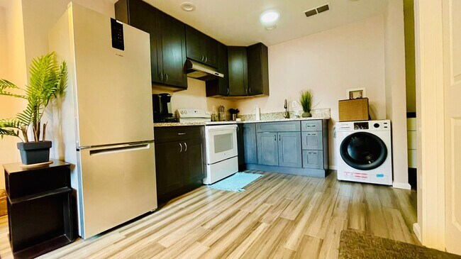 Kitchen with washer - 1051 Columbus Dr