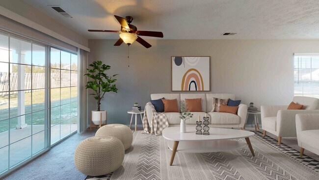 Sala de estar con ventana grande - Harrison Place Apartments