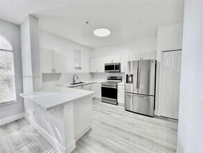 Building Photo - 120 Jacaranda Country Club Dr