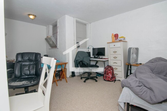Building Photo - Central Location Steps from the T Stop. He...