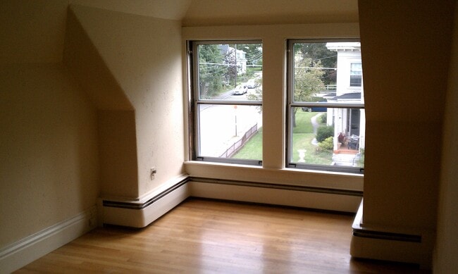 Bedroom. Window faces southwest. - 82 Warren St