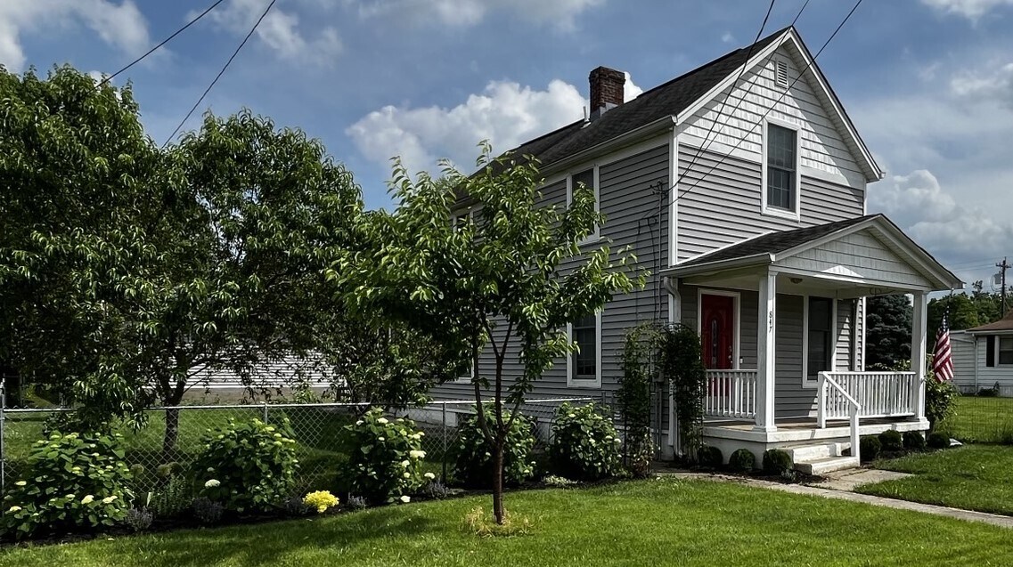 Mature fruit trees and hydrangeas - 847 Elm St