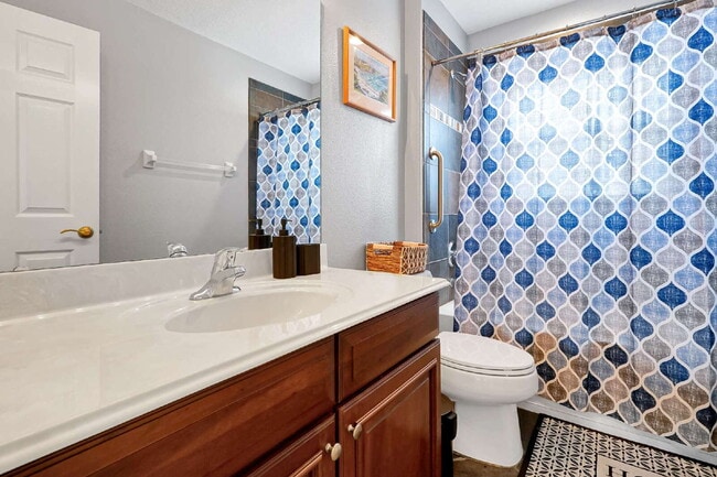 Building Photo - "Upscale Living on Boating Blvd | 5-BR/4.5-BA Executive Residence"