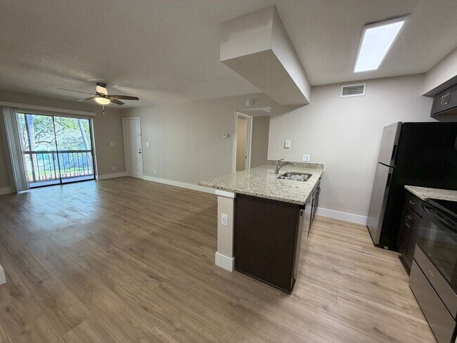 Building Photo - ANNUAL RENTAL - 2 BED / 2 BATH CONDO AT MYSTIC GARDENS