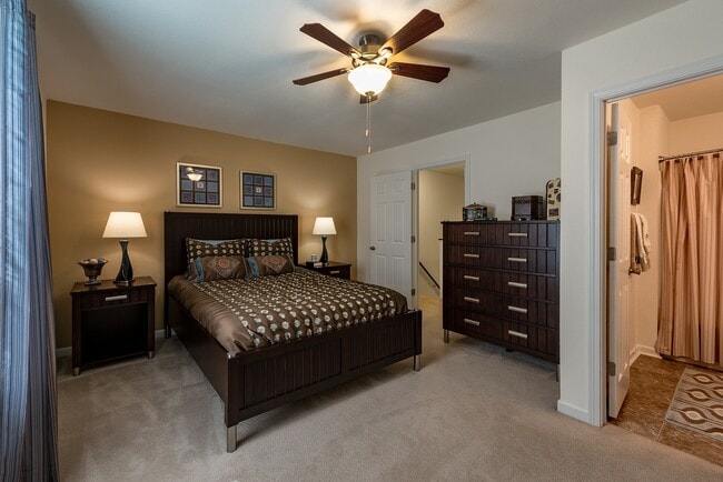 Large bedroom with private bathroom at Shadowmoss Pointe - Shadowmoss Pointe Apartments and Townhomes