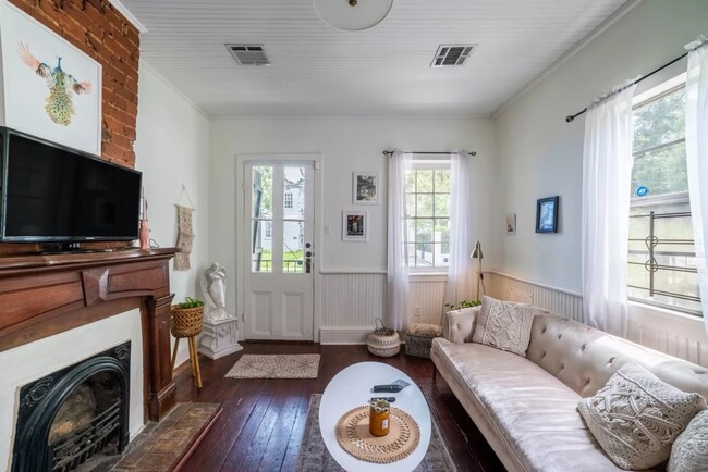 Living room with original fireplace - 1510 Euterpe St