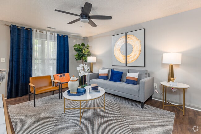 Classic. 2BR, 1BA - 906SF - Living Room - Villages at Carver
