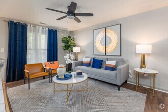 Classic. 2BR, 1BA - 906SF - Living Room - Villages at Carver