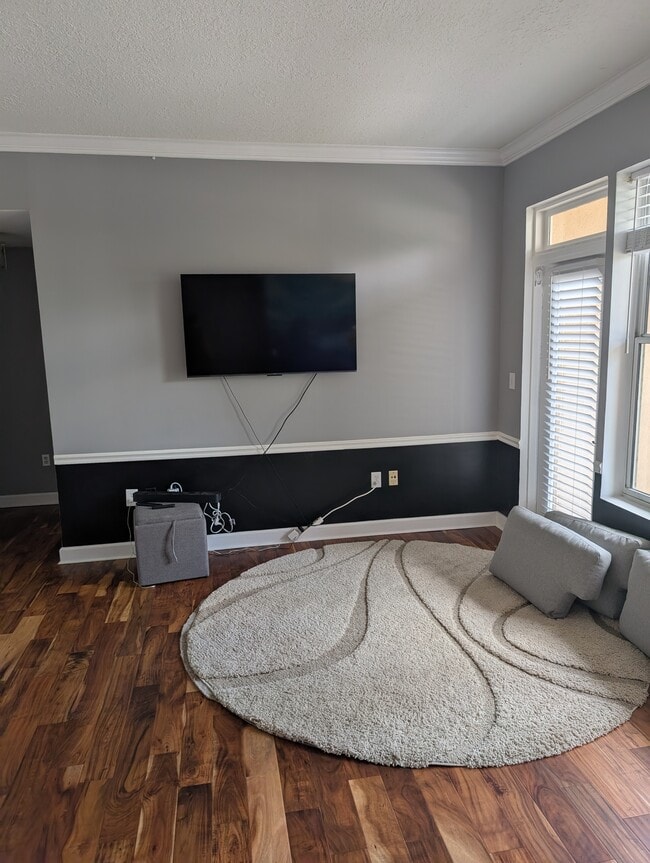 Unit comes unfurnished except two wall-mounted Smart TVs. Wired for GoogleFiber (tenant pays). - 1101 Juniper St NE
