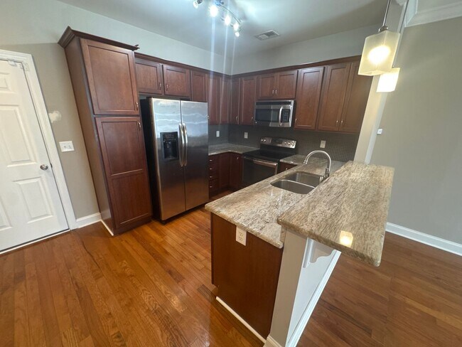 Building Photo - Modern Townhome Just Minutes from Downtown...