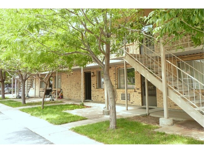 Explore this serene residential community nestled amidst flourishing trees. - Villa Rosa