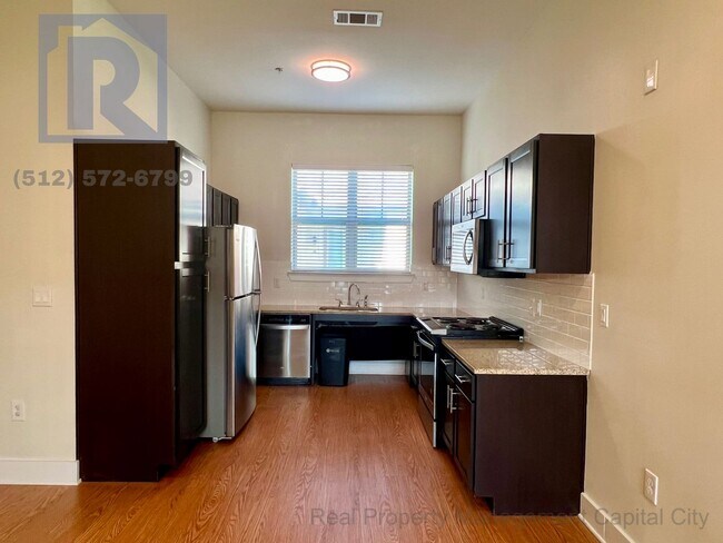 Building Photo - Comfortable 2-bedroom, 2-bathroom Condo wi...