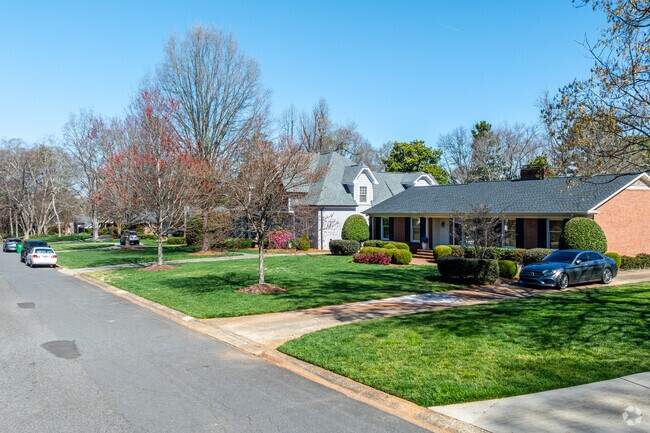 Tree-lined streets contribute to Barclay Downs' established character.