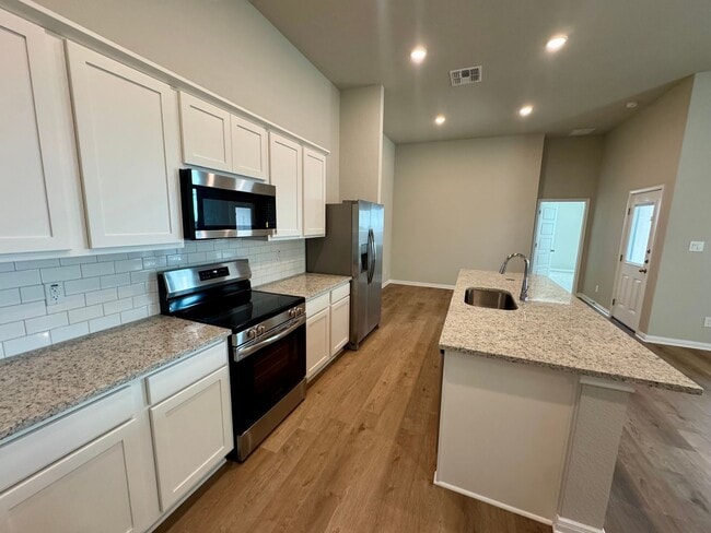 Building Photo - Luxury 4-Bed, 2.5-Bath Duplex in Buda,TX!