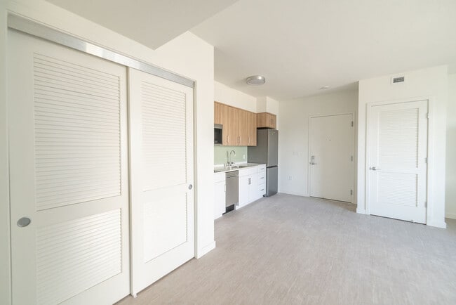 Building Photo - Secure Your Dream Home at RUMI – Fully Furnished Units with Stunning Views!