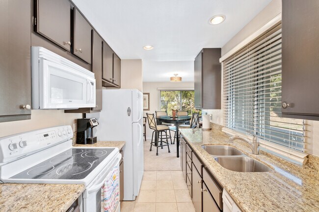 Upgraded kitchen with granite countertops - 22152 Caminito Amor