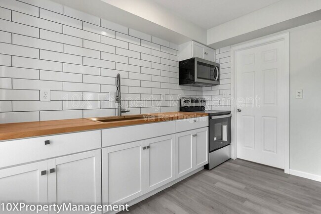 Foto del edificio - 5401 Adderley Ave