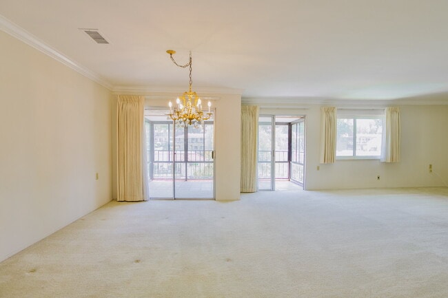 Building Photo - Spacious 3BD/3BA Condo with Enclosed Patio and Resort-style Amenities