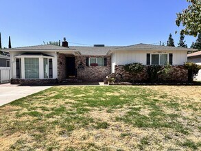Building Photo - 144 N Pollasky Ave